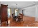 Bright dining room showcasing classic details, hardwood floors, and traditional furnishings at 106 Zurich Ln, Statesville, NC 28625
