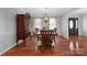 Charming dining area with wood floors, natural light, and traditional furnishings at 106 Zurich Ln, Statesville, NC 28625