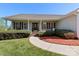 Inviting front porch with a double door entry, red mulch, and manicured landscaping at 106 Zurich Ln, Statesville, NC 28625