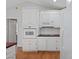 Functional kitchen with white cabinetry, updated appliances, and a convenient layout at 106 Zurich Ln, Statesville, NC 28625