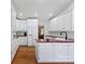 Spacious kitchen features white cabinets, a center island, and stainless steel appliances at 106 Zurich Ln, Statesville, NC 28625