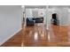 Spacious living room features hardwood floors and a comfortable seating area with fireplace at 106 Zurich Ln, Statesville, NC 28625