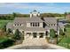 Community clubhouse at Winding Walk, featuring well-manicured landscaping, and architectural details at 10643 Rippling Stream Nw Dr, Concord, NC 28027