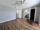 Spacious bedroom offering wood floors, a ceiling fan, and includes access to the closet at 11015 Harrowfield Rd, Charlotte, NC 28226