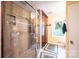 Bathroom featuring glass shower, vanity, and stained glass window providing natural light at 1213 10Th Street Nw Ln # 3, Hickory, NC 28601