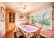 Bright dining room with hardwood floors, large window, and vintage wallpaper at 1213 10Th Street Nw Ln # 3, Hickory, NC 28601