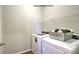 Laundry room with modern washer and dryer, featuring shelving for storage at 127 Way Cross Ln, Troutman, NC 28166