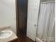 Bathroom featuring a sink and shower with white curtain at 1300 Irish Potato Rd, Concord, NC 28025