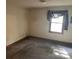 Bedroom featuring carpet floors and a window with dark purple curtains at 1300 Irish Potato Rd, Concord, NC 28025