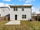 Backyard with a concrete patio and partial wood fence at 1325 Crandon Dr, Charlotte, NC 28216