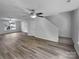 Spacious living room boasts wood flooring, ceiling fans, and ample natural light at 1325 Crandon Dr, Charlotte, NC 28216