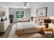 Bedroom virtually staged, featuring neutral paint, a ceiling fan, carpet and natural light at 1325 Crandon Dr, Charlotte, NC 28216