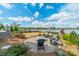 Spacious backyard patio with comfortable seating and a fire pit, overlooking a scenic lake view at 139 Little Indian Loop, Mooresville, NC 28117