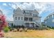 Expansive backyard with a multi-level patio perfect for outdoor entertaining and enjoying the view at 139 Little Indian Loop, Mooresville, NC 28117