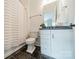 Stylish bathroom featuring black marble floors, white cabinetry, and modern fixtures at 139 Little Indian Loop, Mooresville, NC 28117