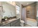 Bright bathroom featuring a tub/shower combo and stylish chevron shower curtain at 139 Little Indian Loop, Mooresville, NC 28117