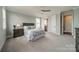 Comfortable bedroom with plush carpeting, ceiling fan, and neutral color scheme at 139 Little Indian Loop, Mooresville, NC 28117