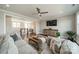 Inviting living room with comfortable seating, stylish decor, and a ceiling fan at 139 Little Indian Loop, Mooresville, NC 28117