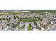 Aerial view of a suburban neighborhood with well-maintained homes and green spaces at 1519 Cedar Park Dr, Pineville, NC 28134