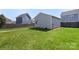 Well-maintained backyard with lush green grass and detached garage at 1519 Cedar Park Dr, Pineville, NC 28134