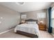 Comfortable bedroom with soft carpet, window treatments, a comfortable bed, and tasteful decor at 1519 Cedar Park Dr, Pineville, NC 28134