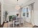 Bright dining room with ample seating, a chandelier, and large windows at 1519 Cedar Park Dr, Pineville, NC 28134