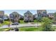 Well-manicured front yard with a modern two-story home featuring gray siding at 1519 Cedar Park Dr, Pineville, NC 28134