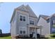Charming two-story home with light gray siding, white trim, and a welcoming front porch at 1519 Cedar Park Dr, Pineville, NC 28134