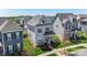 Charming two-story home with a welcoming front porch and manicured landscaping at 1519 Cedar Park Dr, Pineville, NC 28134