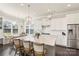 Open-concept kitchen with a large island, stainless steel appliances, and a breakfast nook at 1519 Cedar Park Dr, Pineville, NC 28134