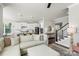 Open-concept living area and kitchen combination with stainless steel appliances and an island at 1519 Cedar Park Dr, Pineville, NC 28134