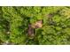 Aerial view of a secluded home nestled among lush greenery, providing privacy and tranquility at 1676 Partridge Cir, Lancaster, SC 29720