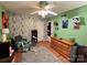 Star Wars themed bedroom with a fan and unique decor and a rocking chair at 1780 Short St, Mount Pleasant, NC 28124