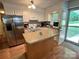 Well-lit kitchen with stainless steel appliances and functional center island at 1780 Short St, Mount Pleasant, NC 28124