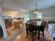 Open concept kitchen and dining area with modern appliances and ample seating at 1780 Short St, Mount Pleasant, NC 28124