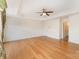 Spacious bedroom featuring a tray ceiling, ceiling fan, and bamboo flooring at 1801 Briarcrest Nw Dr, Charlotte, NC 28269