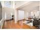 Bright foyer boasts a soaring window above the entry and gleaming hardwood floors that add warmth and character at 1801 Briarcrest Nw Dr, Charlotte, NC 28269