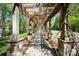 Picturesque walkway with a pergola covered in climbing vines at 1801 Briarcrest Nw Dr, Charlotte, NC 28269