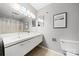Modern bathroom with double vanity, sleek lighting, and contemporary finishes at 181 Riverview Ter, Clover, SC 29710