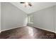 Bright bedroom featuring a ceiling fan, natural light, and beautiful wood floors at 181 Riverview Ter, Clover, SC 29710