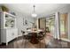 Cozy dining room featuring a glass-top table and sliding door to the outdoor living area at 181 Riverview Ter, Clover, SC 29710