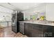 A view of the kitchen, featuring stainless steel appliances and a pass-through to the dining area at 181 Riverview Ter, Clover, SC 29710