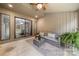 Relaxing covered patio with comfortable seating, ceiling fan, and a view of the backyard at 181 Riverview Ter, Clover, SC 29710