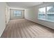 Sunny bedroom with neutral carpet, large windows, and ample natural light at 1907 Caprington Dr, Fort Mill, SC 29707