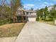 Charming two-story home with a two-car garage and well-maintained landscaping at 1907 Caprington Dr, Fort Mill, SC 29707