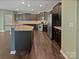 Well-equipped kitchen features granite countertops, stainless steel appliances, and ample cabinet space at 1907 Caprington Dr, Fort Mill, SC 29707