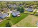 Aerial view of a home with a deck and large backyard in a residential neighborhood at 2003 Ptarmigan Ct, Waxhaw, NC 28173