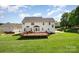 Large two story home with a wooden deck and expansive green backyard at 2003 Ptarmigan Ct, Waxhaw, NC 28173