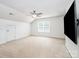 Large bonus room featuring plush carpet, neutral walls, and a ceiling fan at 2003 Ptarmigan Ct, Waxhaw, NC 28173