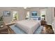 Serene primary bedroom featuring soft colors, natural light, and stylish furnishings creating a relaxing retreat at 22025 Torrence Chapel Rd, Cornelius, NC 28031
